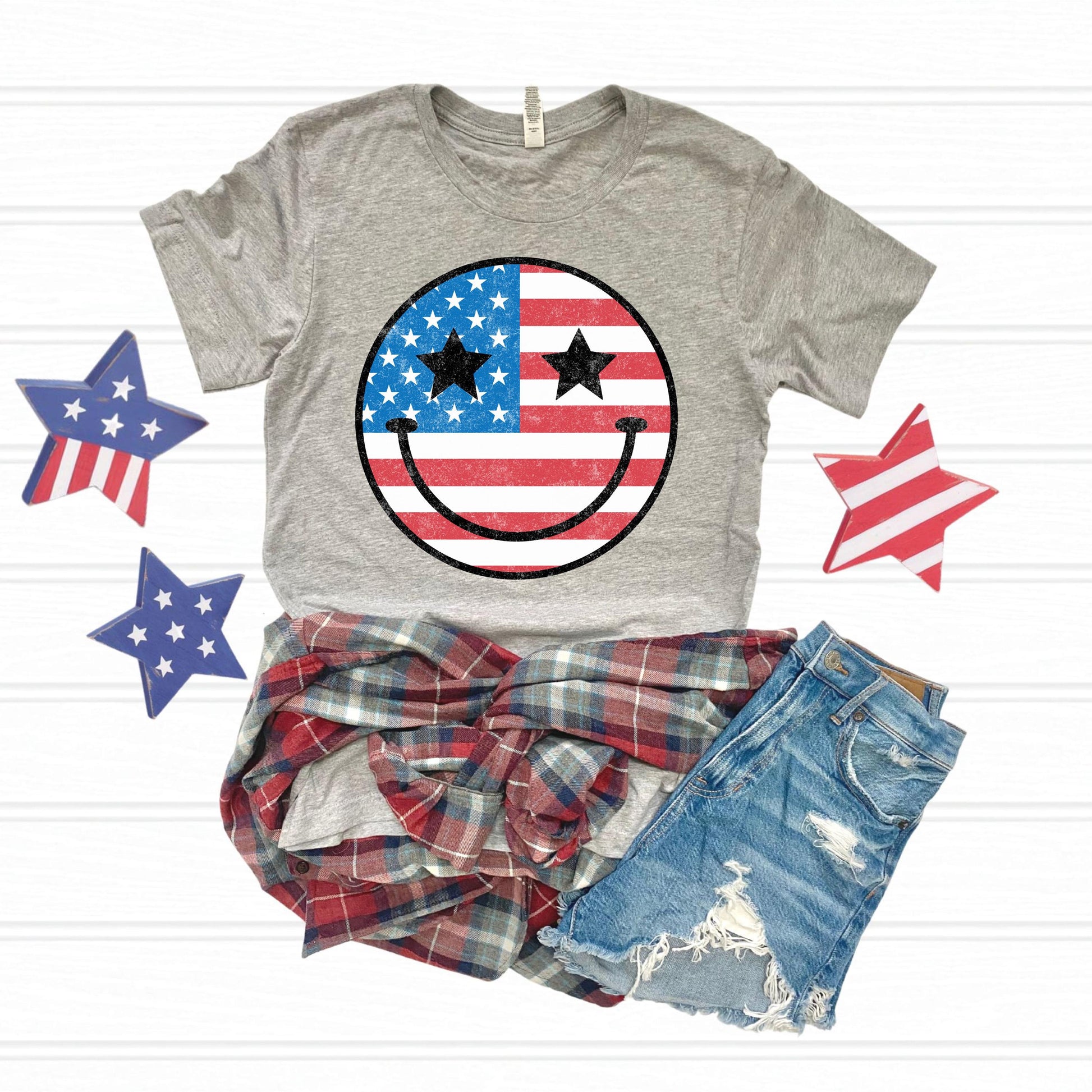 Patriotic Smiley Face T-Shirt – Distressed USA Flag Stars & Stripes Graphic Tee – 4th of July Shirt, Summer Americana Outfit