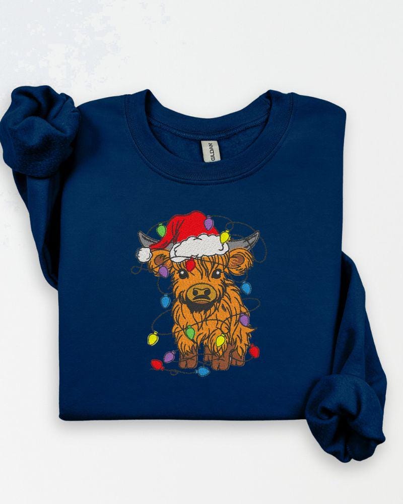 Highland Cow Christmas Sweatshirt – Embroidered Santa Hat Holiday Crewneck – Cozy Farmhouse Animal Lover Sweater Gift