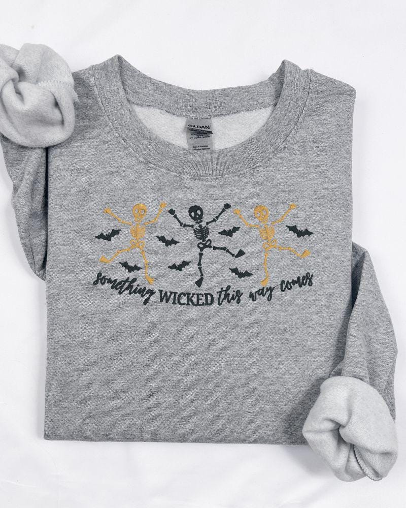 Halloween Skeleton Embroidered Sweatshirt – Spooky Dancing Skeletons & Bats – Cozy Fall Crewneck Sweater Unisex