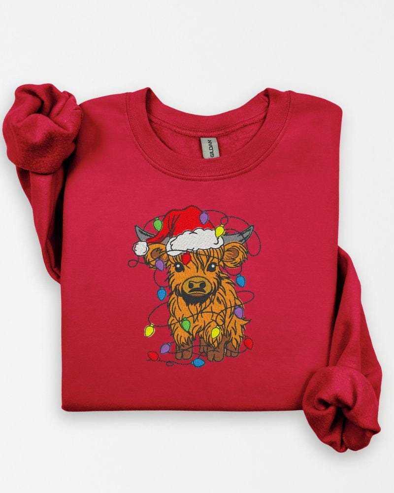Highland Cow Christmas Sweatshirt – Embroidered Santa Hat Holiday Crewneck – Cozy Farmhouse Animal Lover Sweater Gift