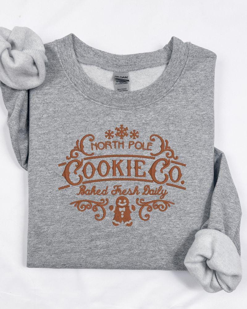 North Pole Cookie Co. Christmas Sweatshirt – Embroidered Gingerbread Holiday Crewneck – Cozy Rustic Farmhouse Style Sweater Gift