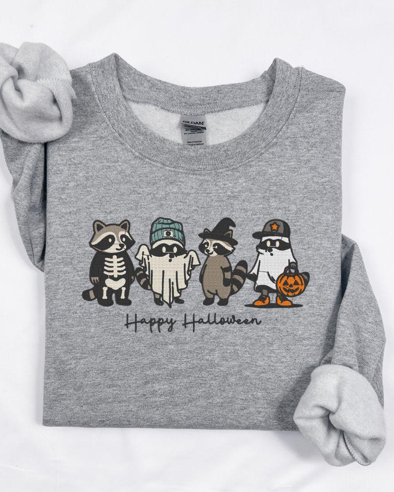 Happy Halloween Raccoon Sweatshirt – Embroidered Cute Fall Crewneck, Cozy Autumn Sweater for Animal Lovers, Spooky Season Unisex Top